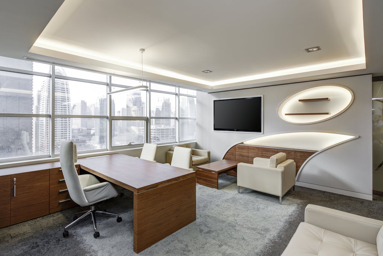service-02 Sleek office space featuring contemporary furniture and city skyline views, ideal for professionals.