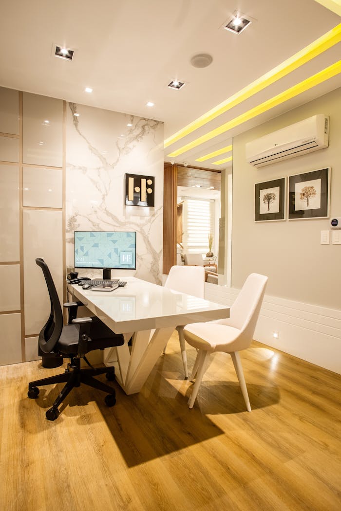 service-02 Elegant modern office interior featuring a sleek desk, chairs, and ambient lighting for a sophisticated environment.